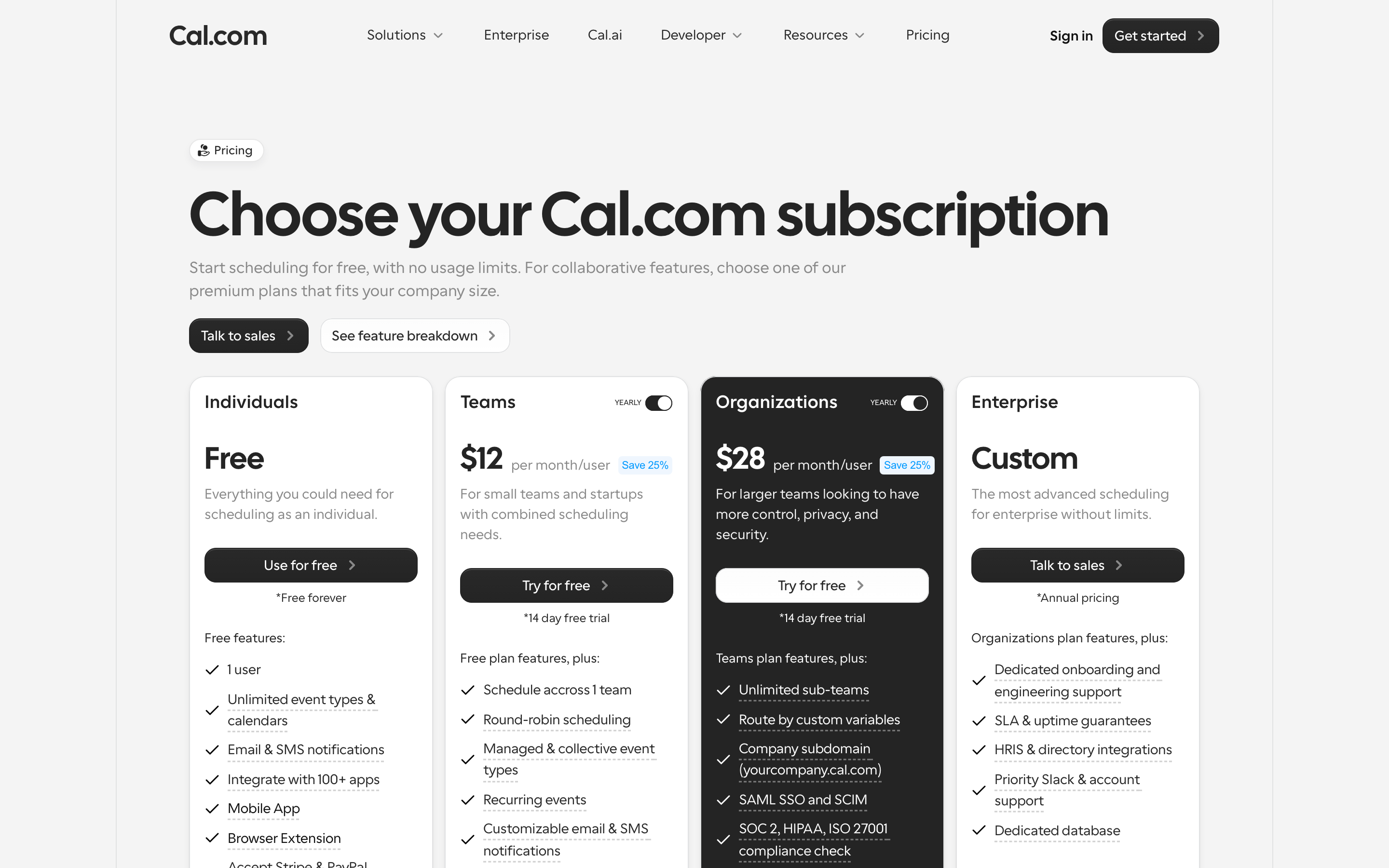Cal.com's pricing page showing the Free, Teams at $12 per user per month, Organizations at $28 per user per month, and Enterprise plans side by side.